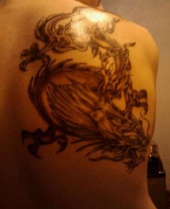 Chinese Dragon Pics Tattoo On Left Shoulder Blade